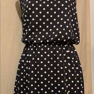 Black polka dot sheath dress with split skirt